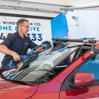 red car windscreen replacement