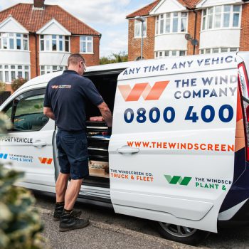 windscreen technician at van
