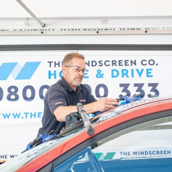 windscreen technician at work