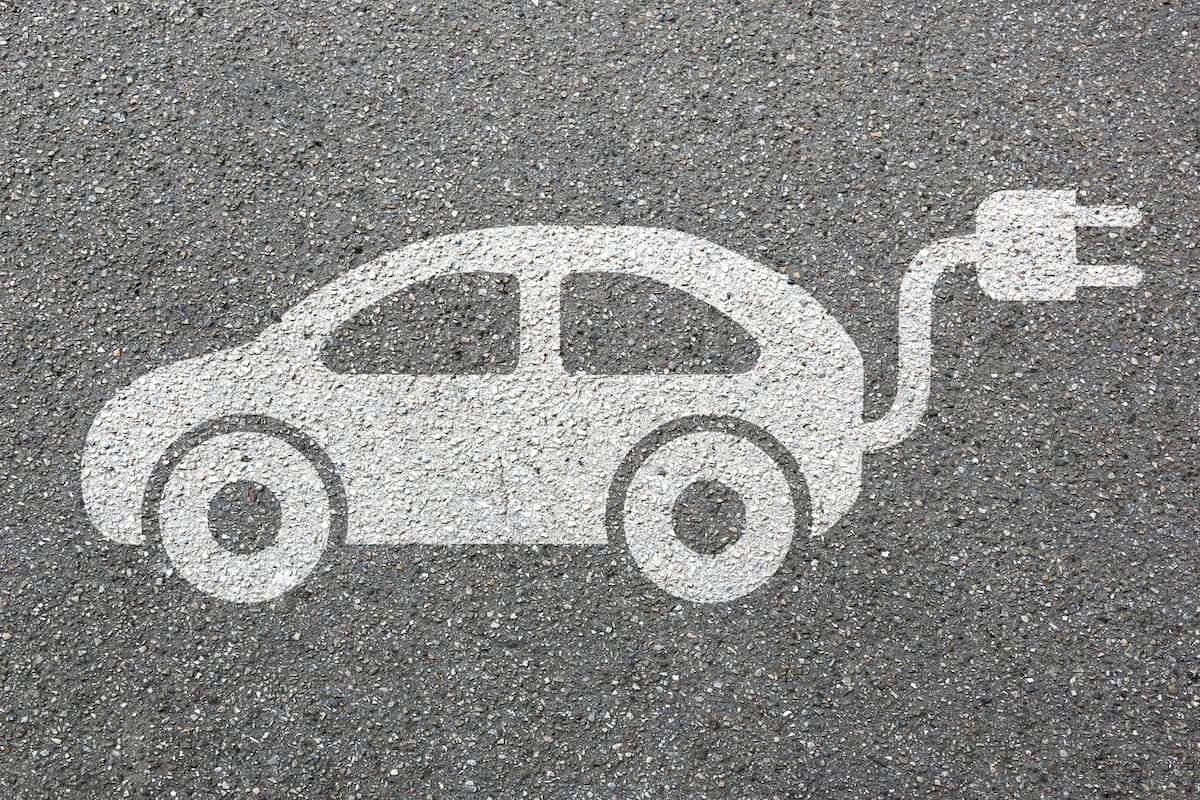 Electric Car Sign on the Ground