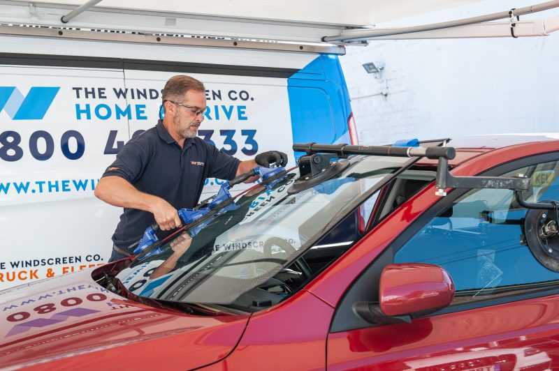 The Windscreen Company technician replacing a car windscreen